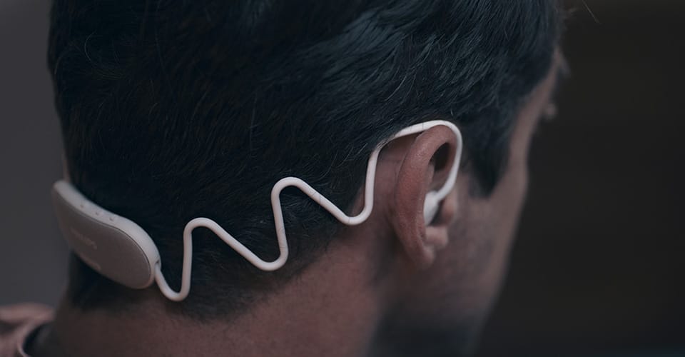 Image showing Philips Sleep Headphones that fit around a man&rsquo;s head tightly, but comfortably.